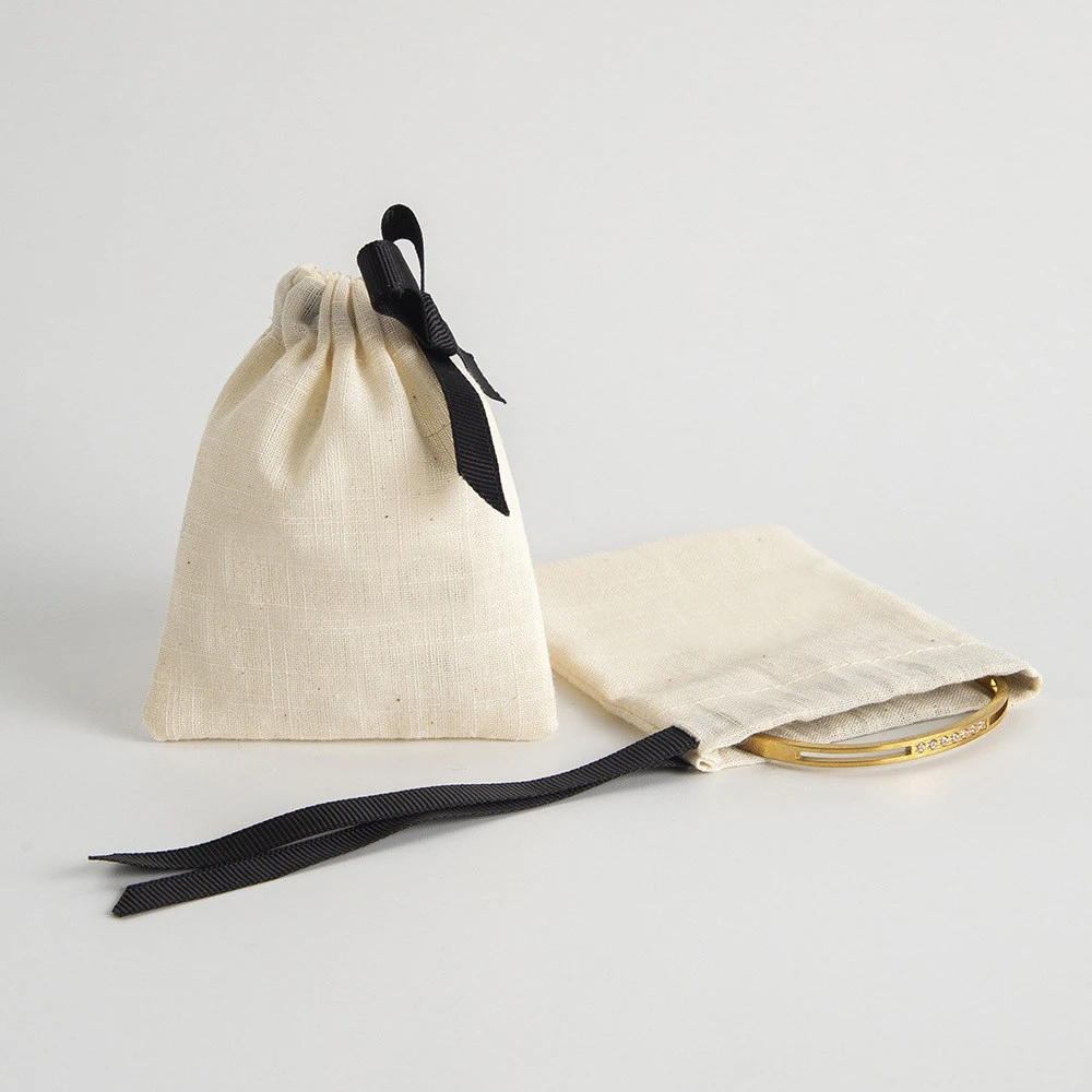 Bolsa de almacenamiento port&aacute;til con cord&oacute;n de algod&oacute;n y lino.