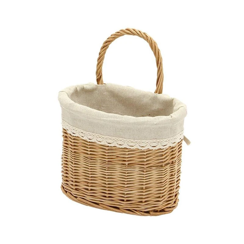 Cesta colgante de mimbre con forro de encaje